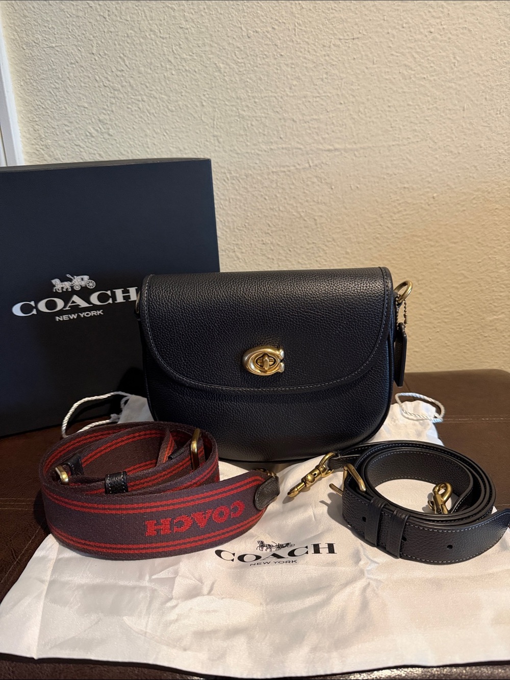 Coach Black Pebbled Leather Crossbody with Red Logo Webbing Strap